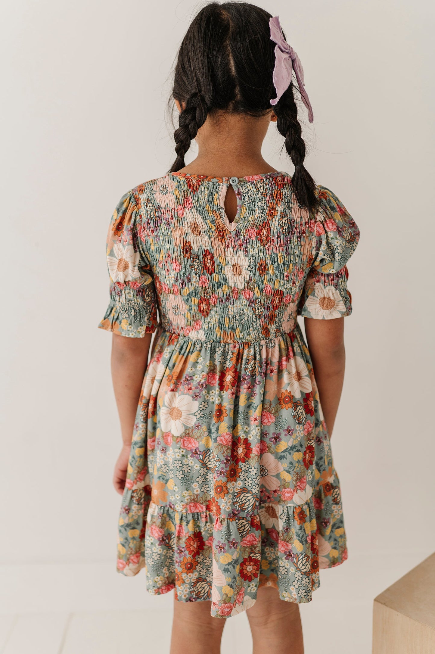 Girls Short Sleeve Smocked Babydoll Dress in Hedde Floral