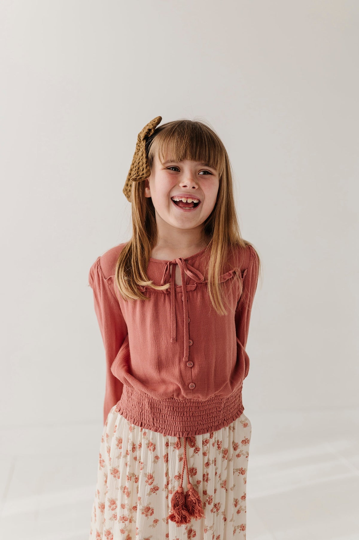 Girls Peasant Blouson Long Sleeve Top in Brick Dust