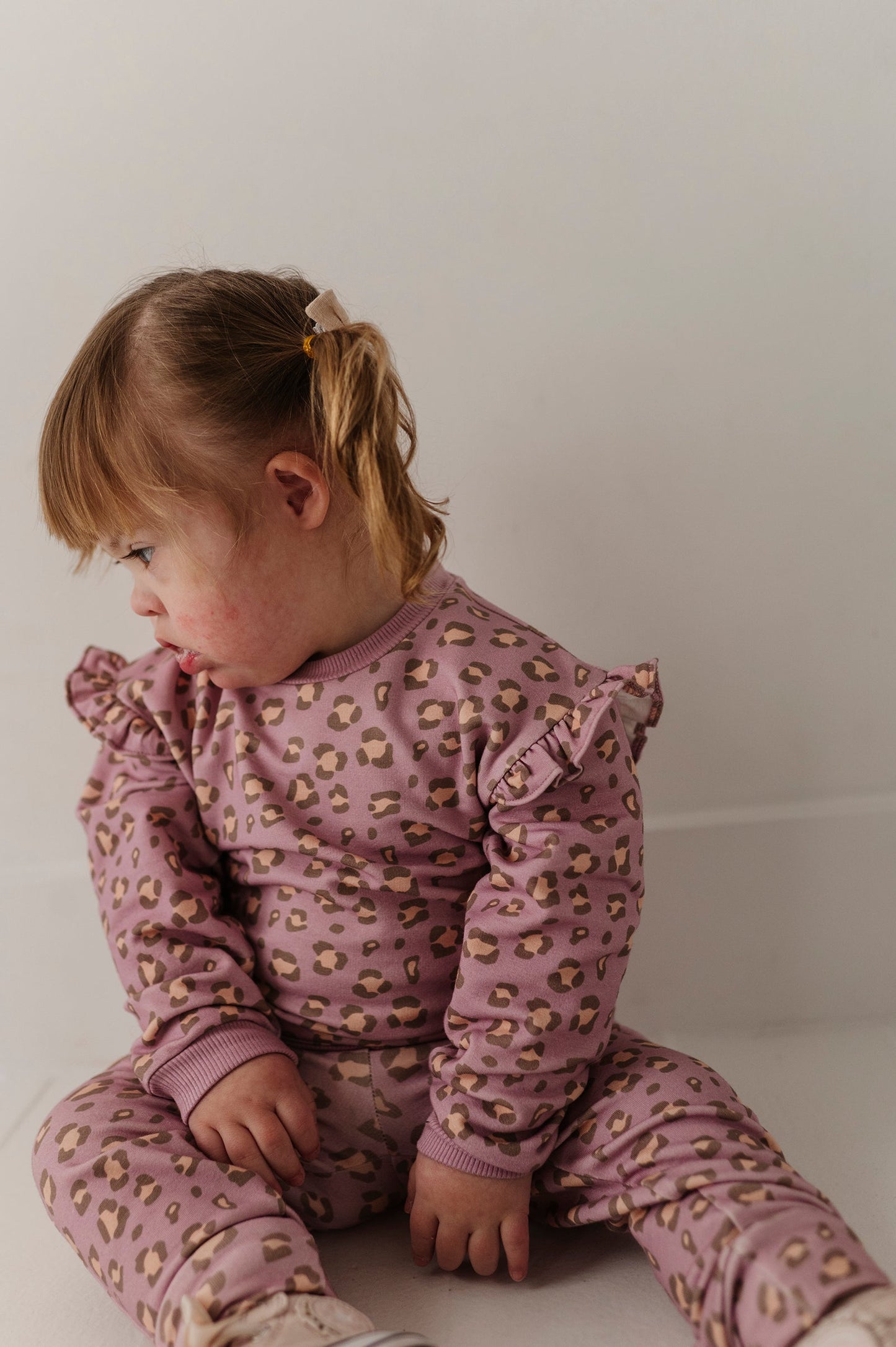 Girls Ruffle Sweatshirt in Cheetah