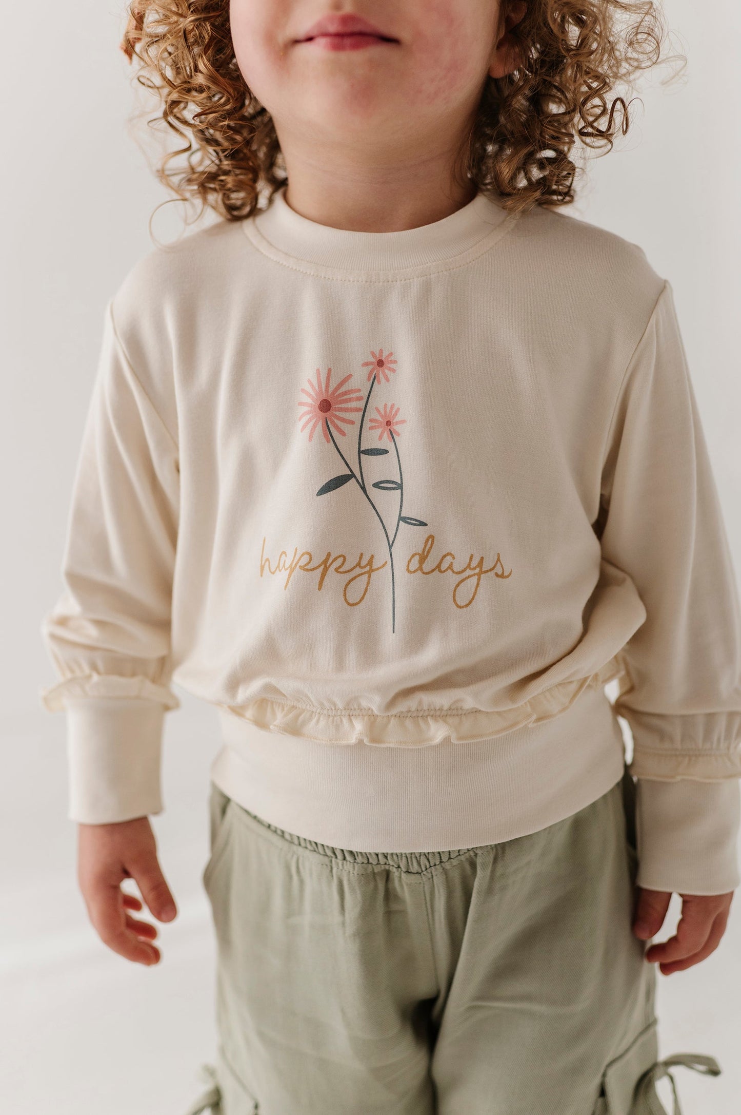 Girls Ruffle Hem Sweatshirt in Happy Days