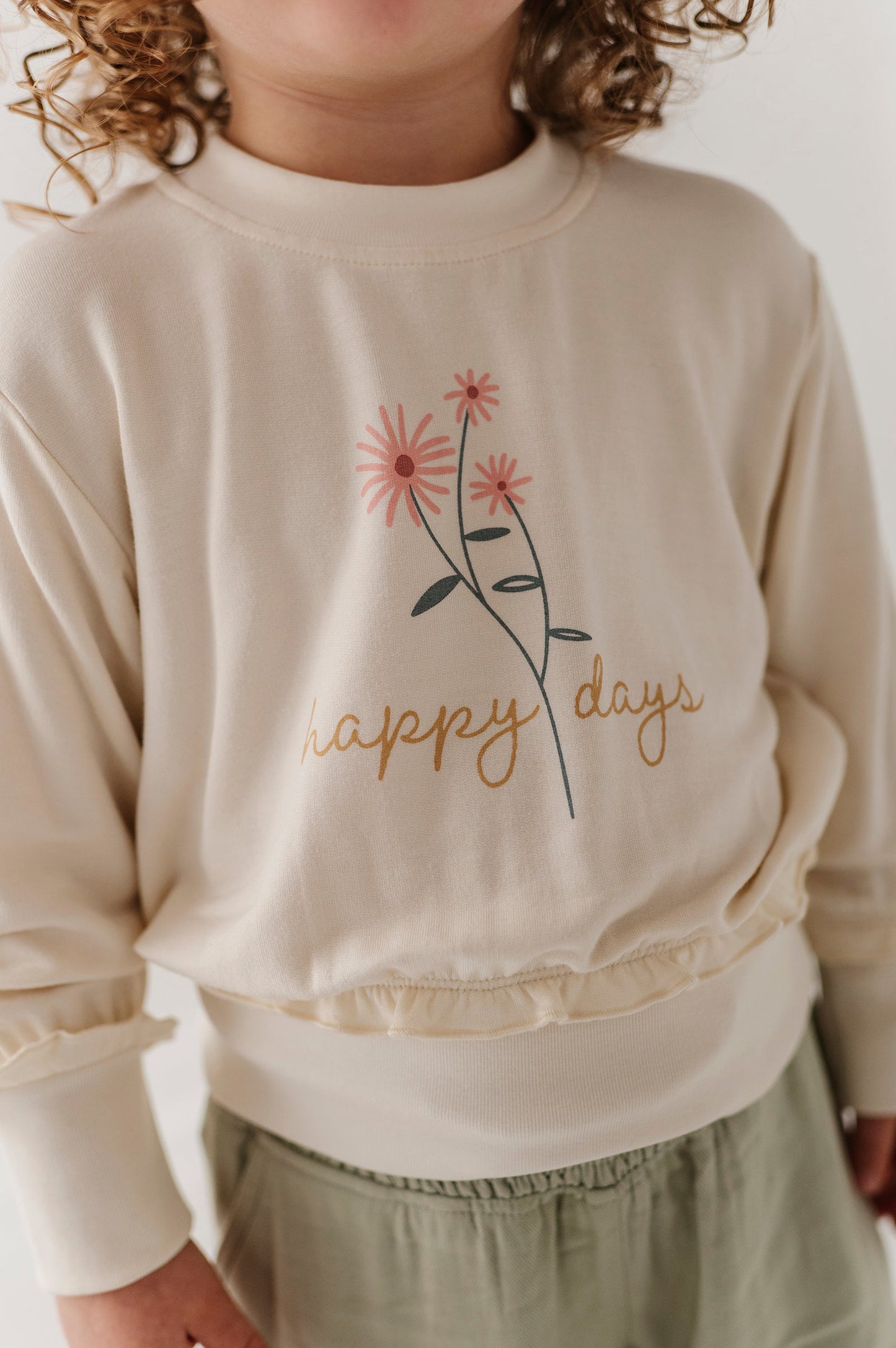 Girls Ruffle Hem Sweatshirt in Happy Days